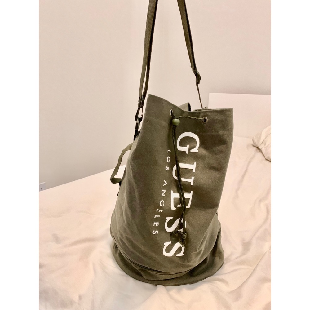 GUESS army green bucket garment bag